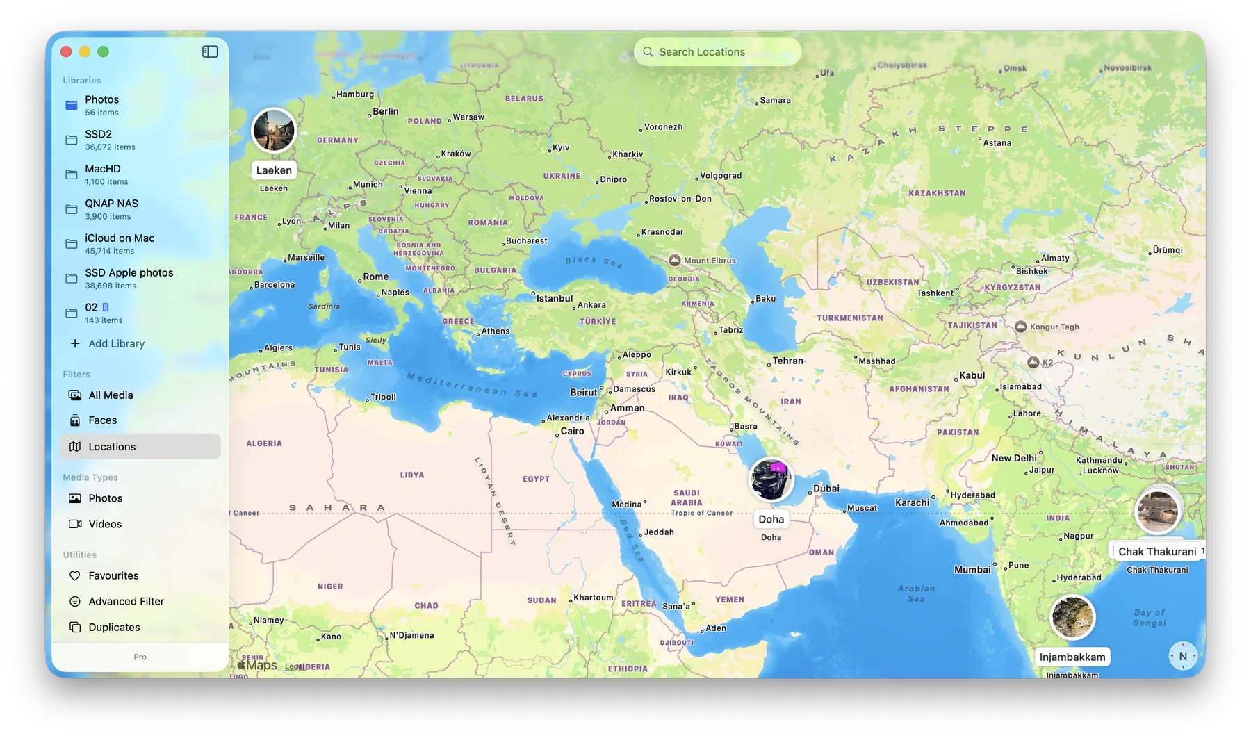 Locations view in LocalPhotos showing photos pinned on a world map